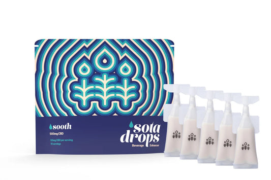 A blue, green and white striped package next to five vials of THC liquid drops.